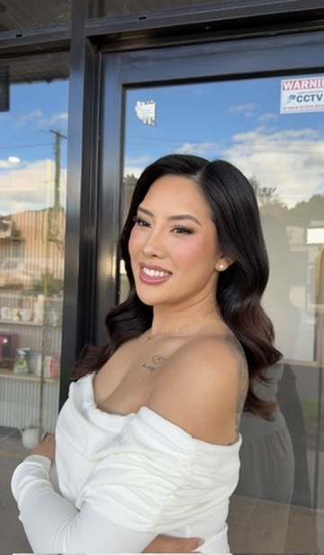 UF Styles client with glossy waves and event makeup